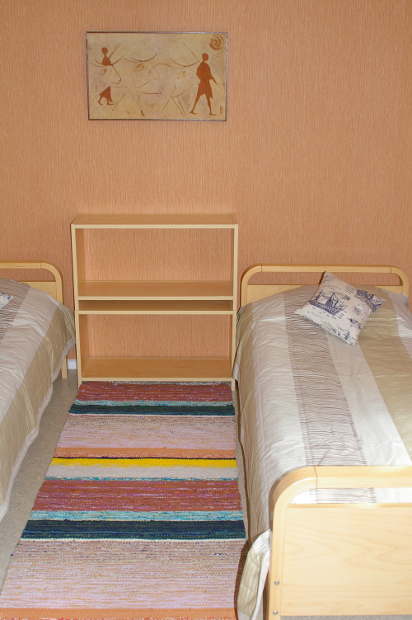 Bedroom in Brown rooms suite